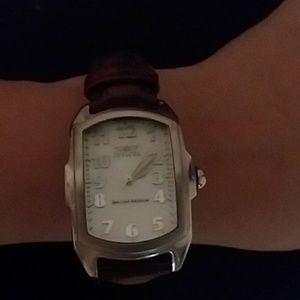 Invicta watch with various colored bands